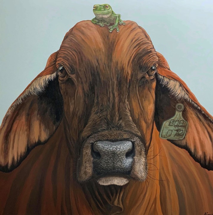A painting of a frog sitting on a cow's head