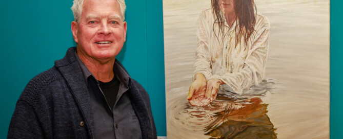 Lew Brennan with 2026 Open winning artwork The awakening.